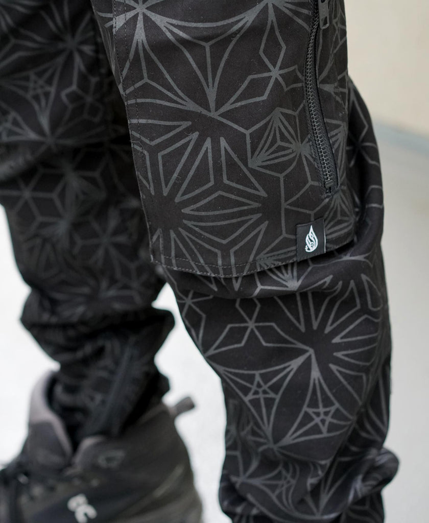 Cloaked Cargo Joggers by Threyda