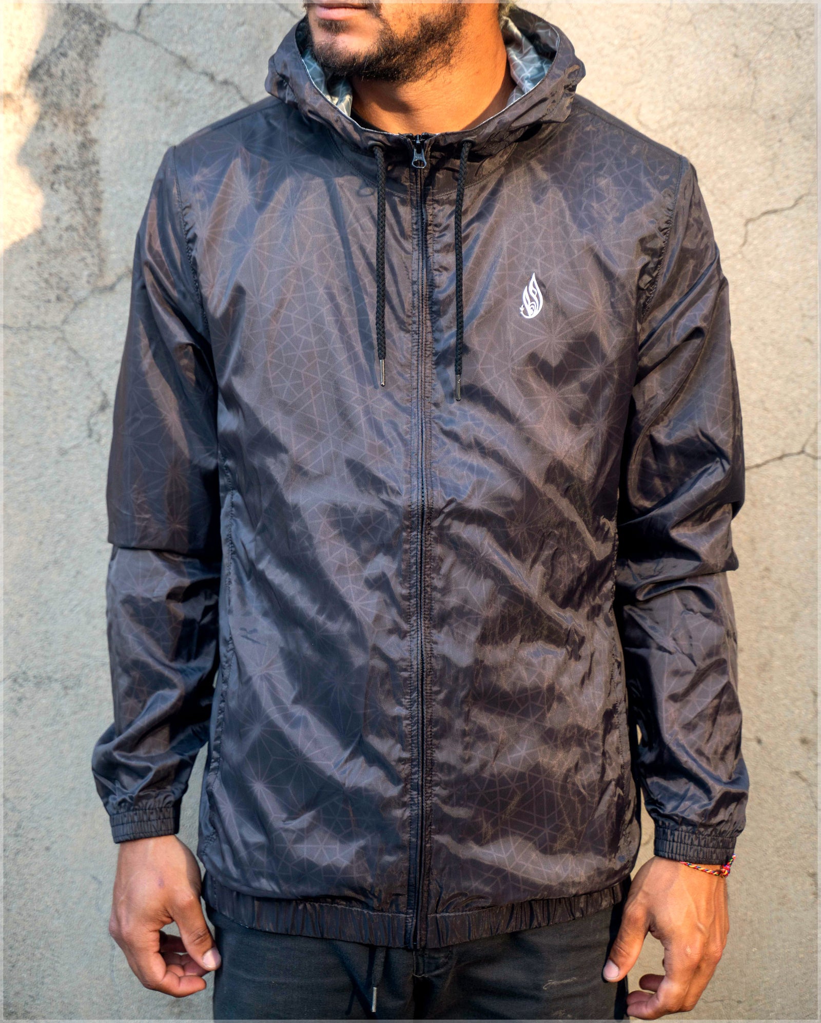 Black Asana Translucent Windbreaker by Threyda