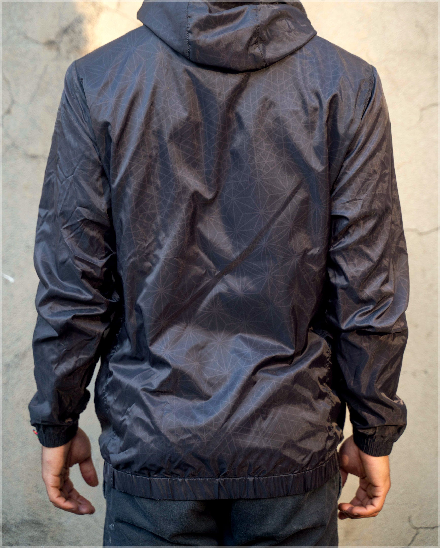 Black Asana Translucent Windbreaker by Threyda