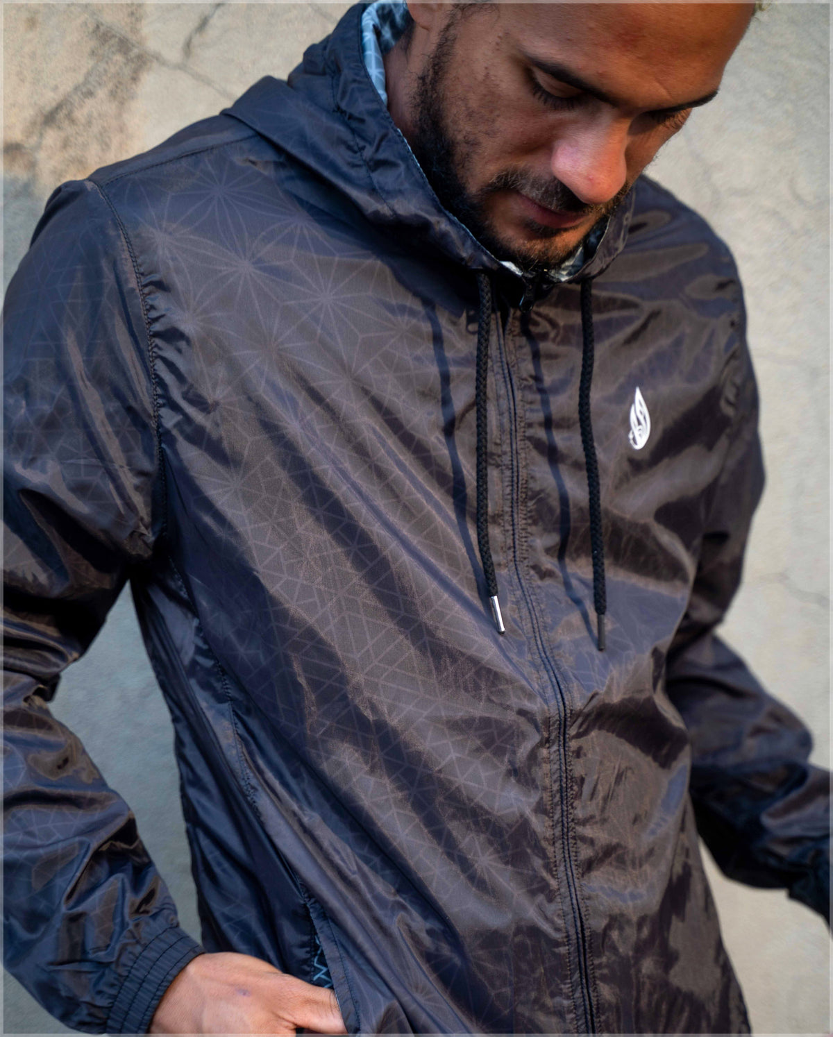 Black Asana Translucent Windbreaker by Threyda
