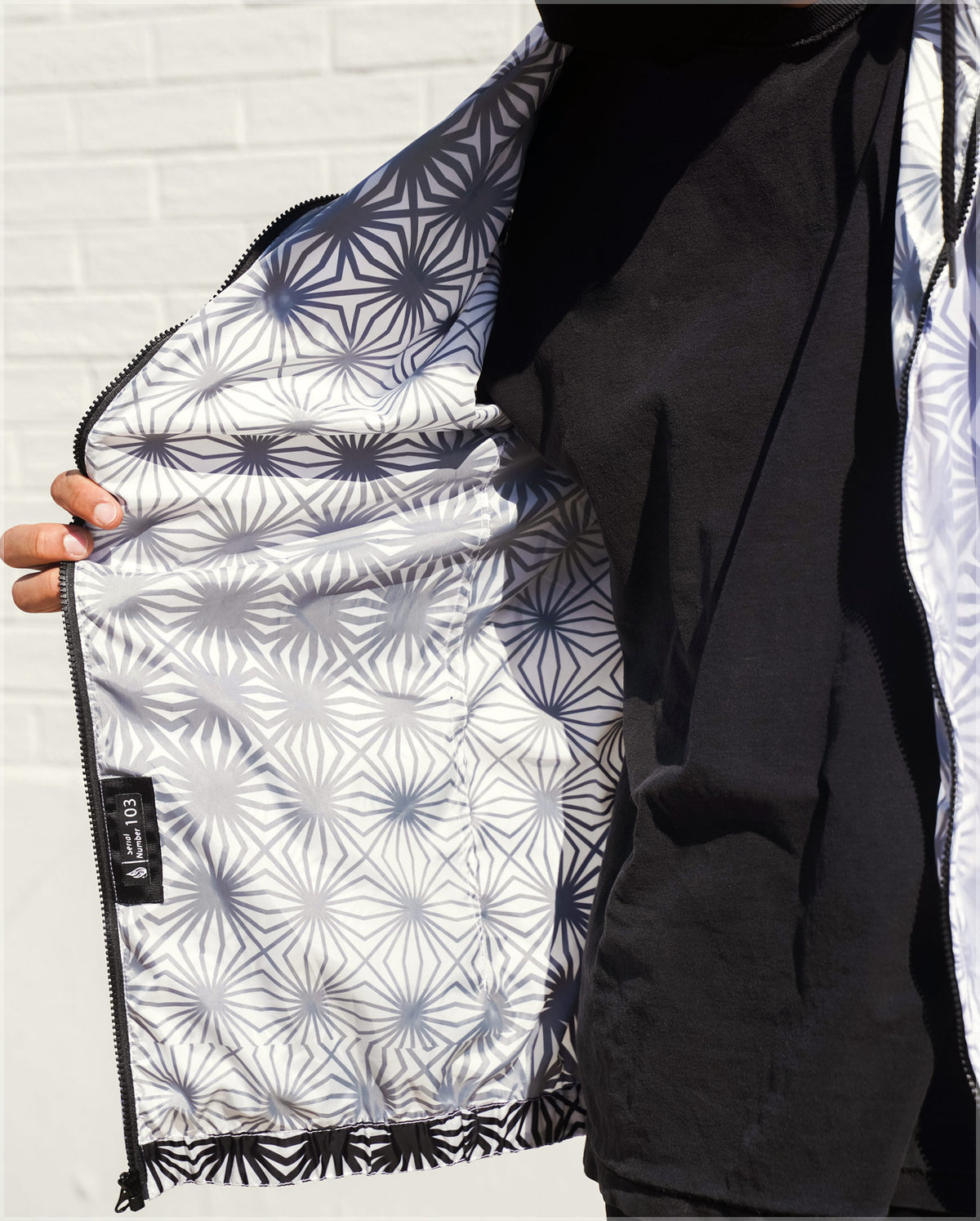 Breakthrough Translucent Windbreaker Hoodie by Threyda