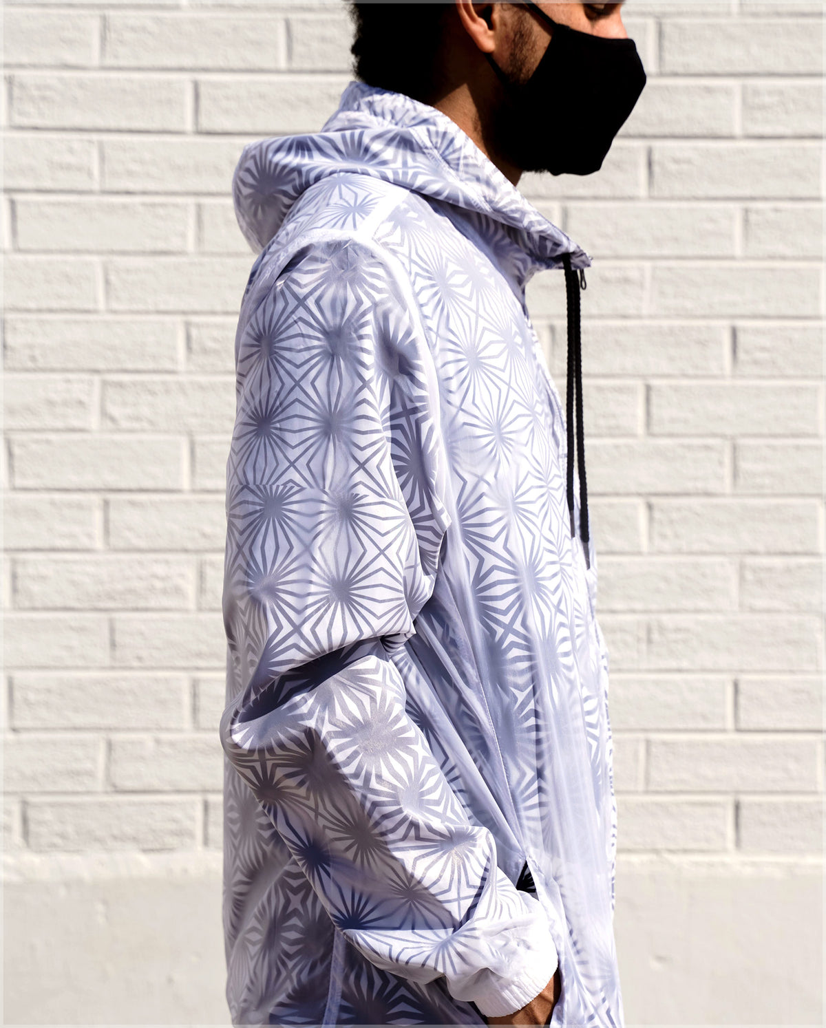 Breakthrough Translucent Windbreaker Hoodie by Threyda