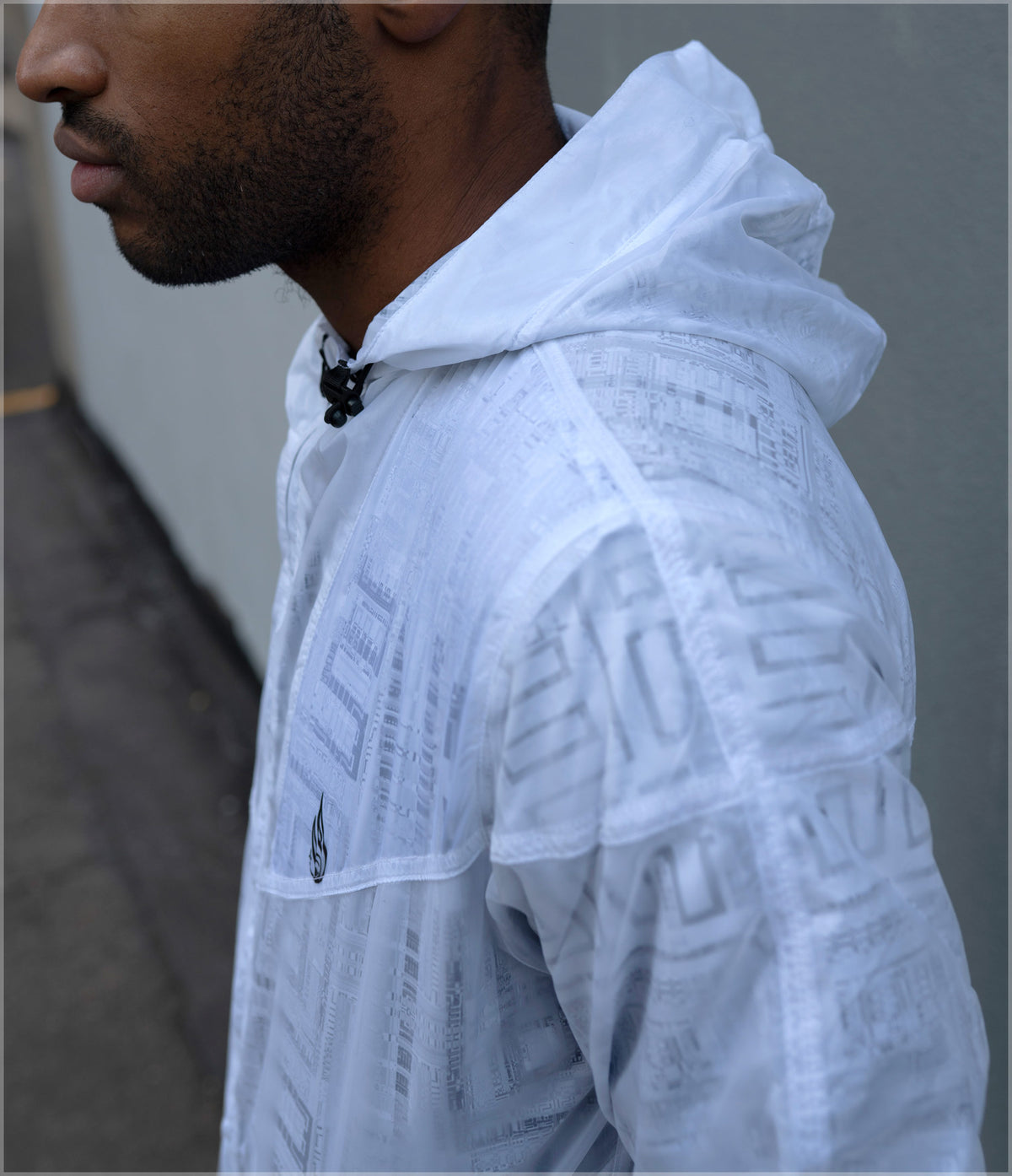 Fragmentation Transparent Windbreaker by Frame of Mind