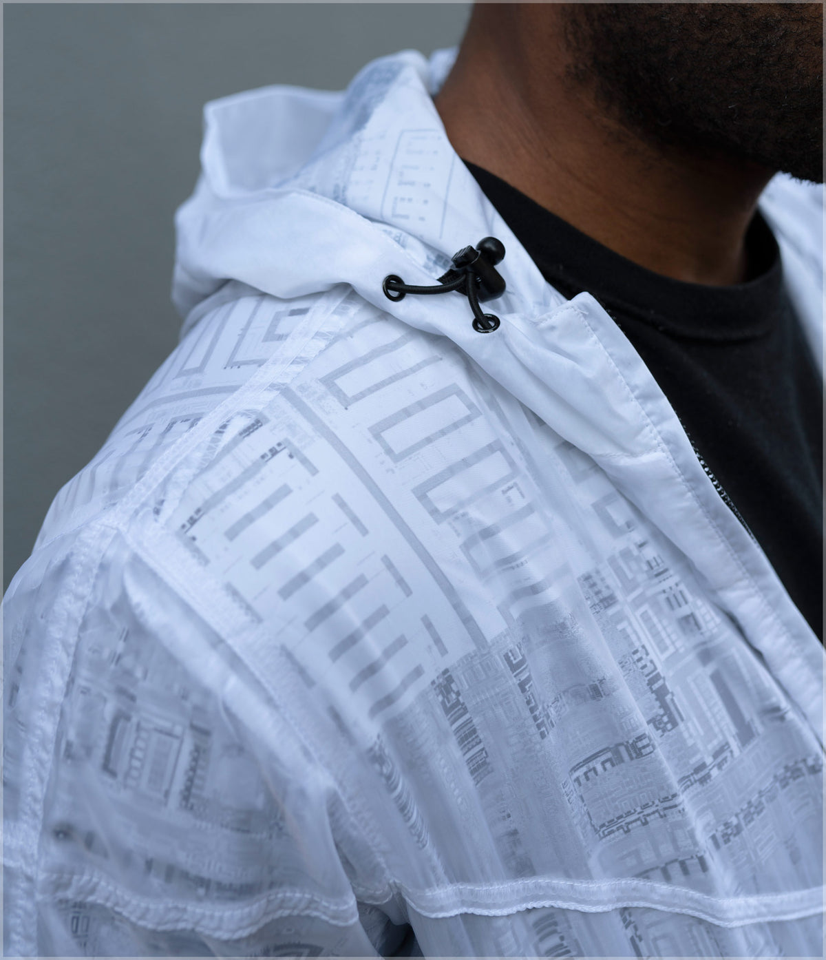 Fragmentation Transparent Windbreaker by Frame of Mind