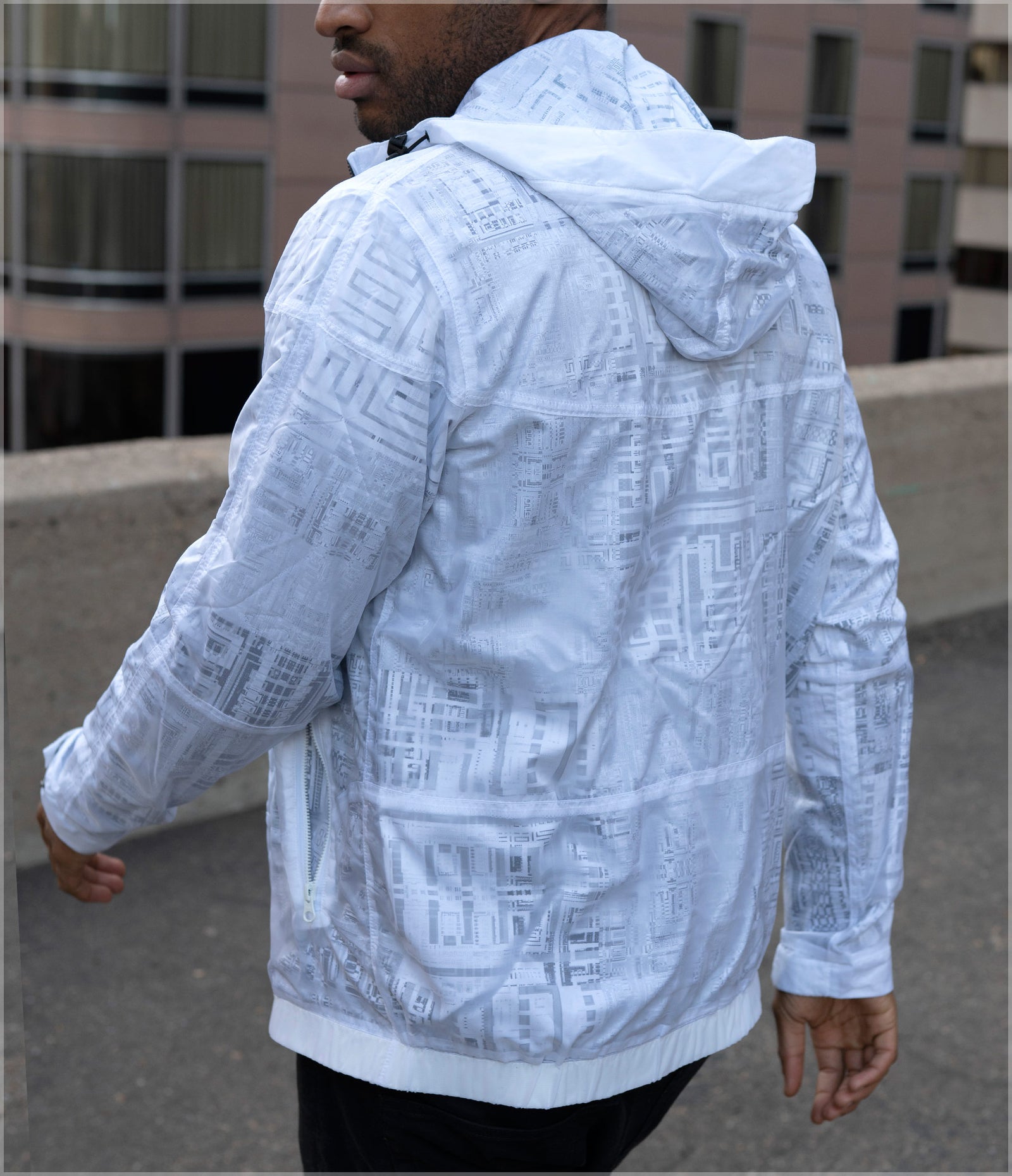 Fragmentation Transparent Windbreaker by Frame of Mind