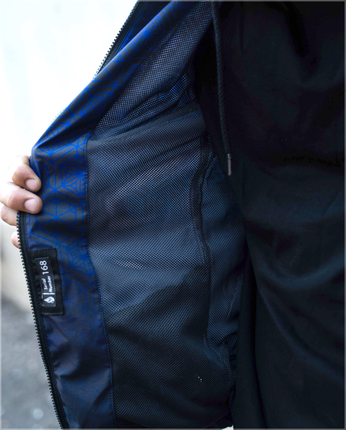 Alignment Windbreaker Hoodie by Threyda